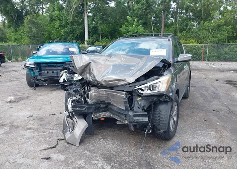 2014 Hyundai Santa Fe Sport 2.4L z USA, uszkodzony, nr VIN 5XYZU3LB0EG217513